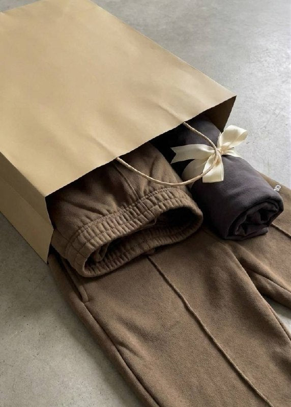FROND gift bag with mocha brown sweatpants and free rooted tee